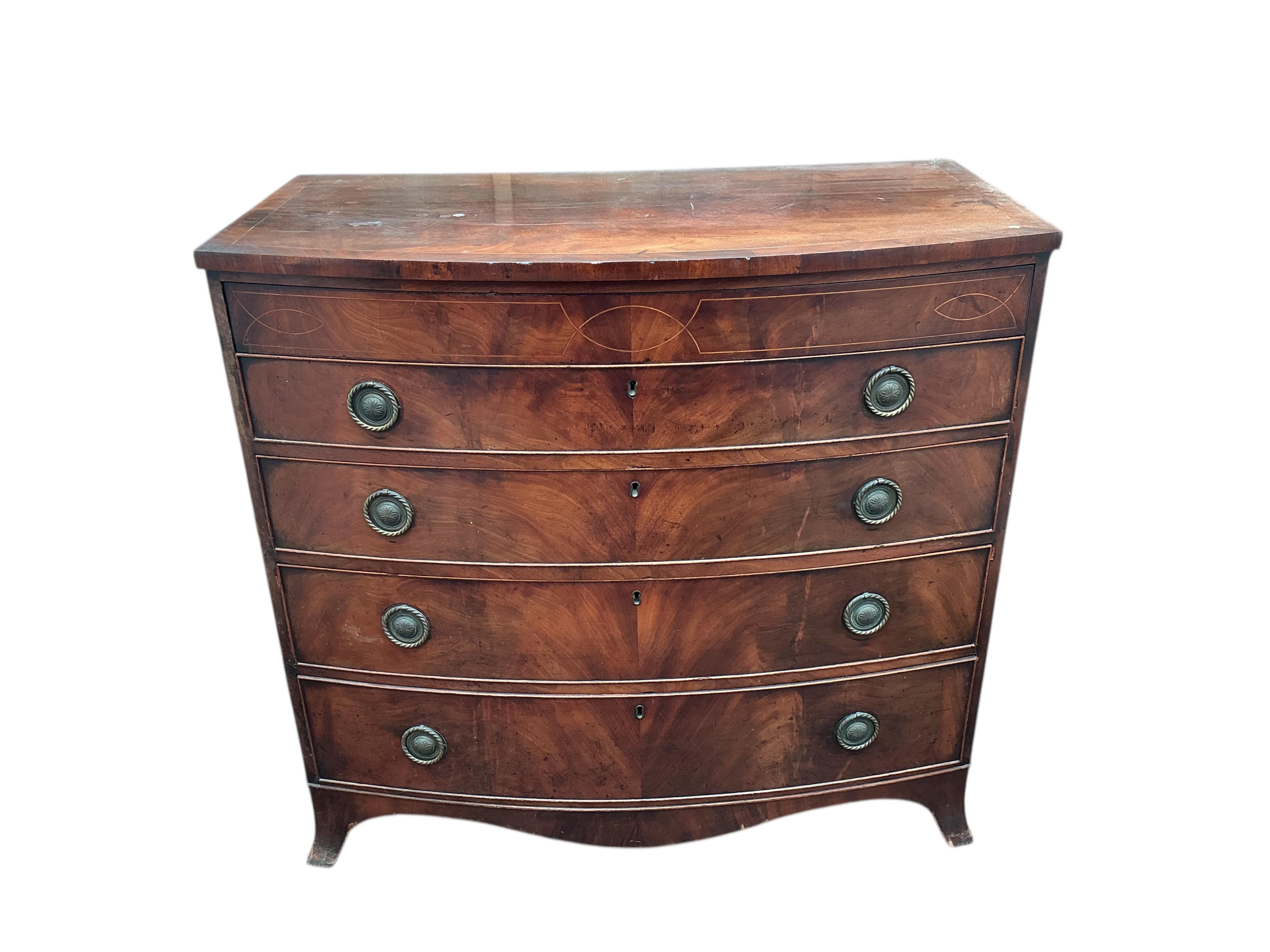 A Regency inlaid mahogany bowfront chest of drawers, width 106cm, depth 56cm, height 100cm
